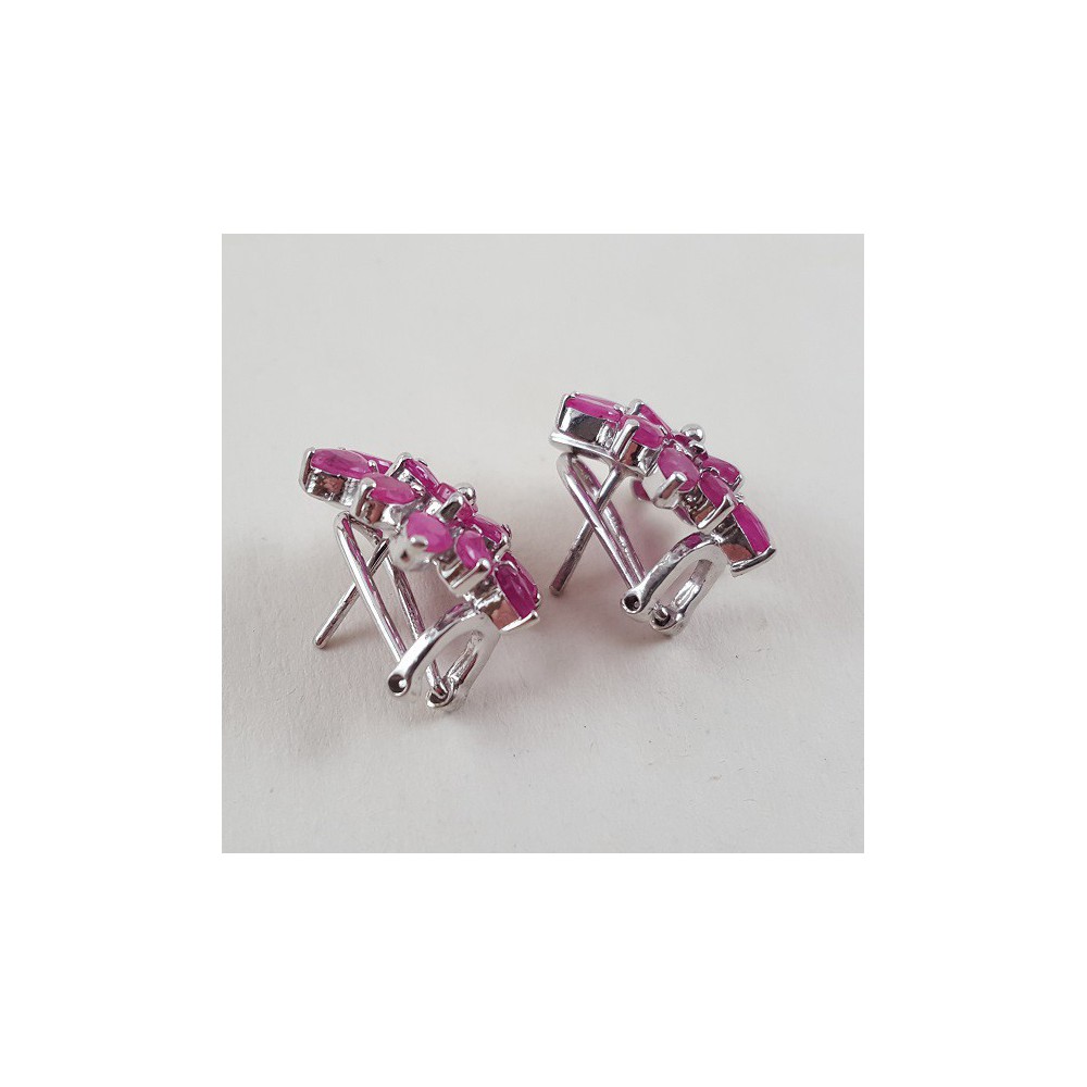 Silver earrings set with rubies