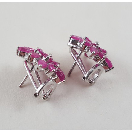 Silver earrings set with rubies