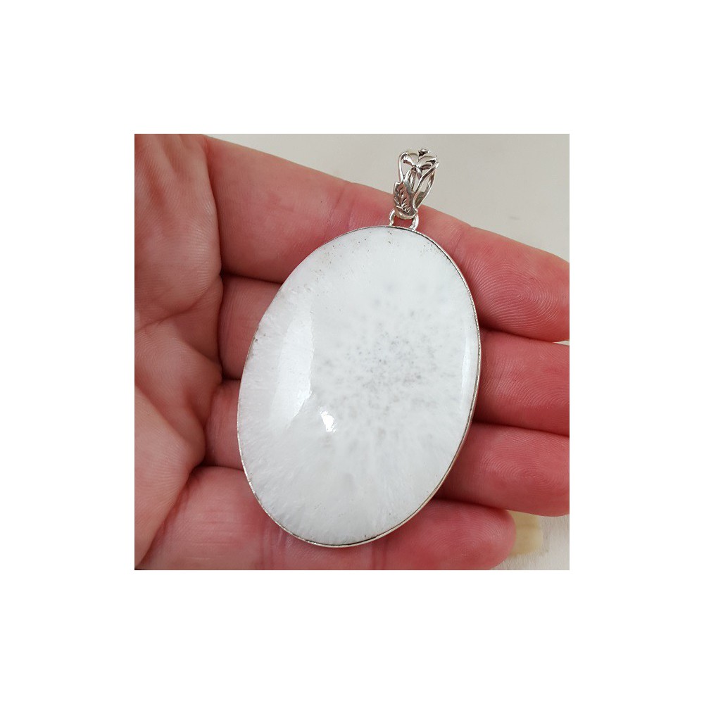 Silver pendant set with large wide oval scolecite