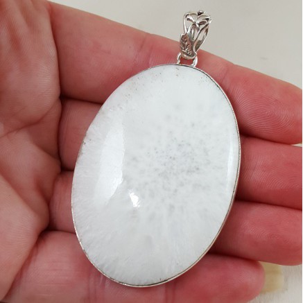 Silver pendant set with large wide oval scolecite