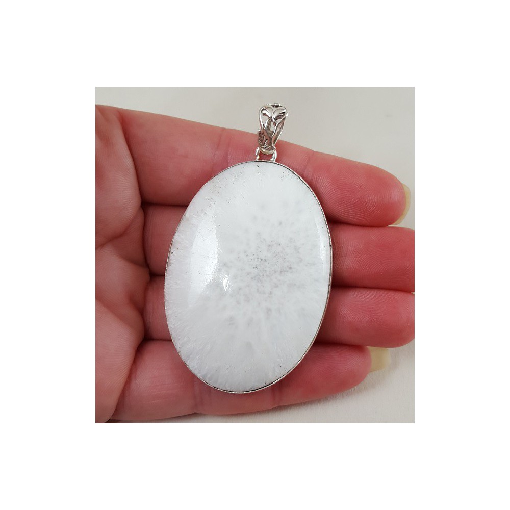 Silver pendant set with large wide oval scolecite