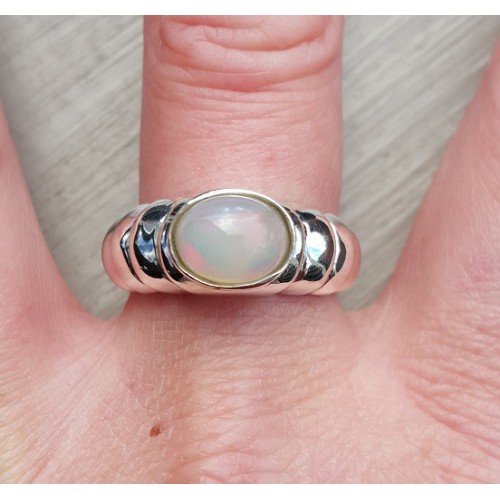 Silver ring set with transverse oval ethiopian opal 19 mm