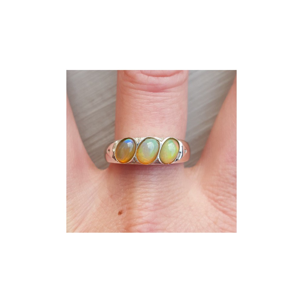 Silver ring set with three ethiopsiche opals 19.7 mm