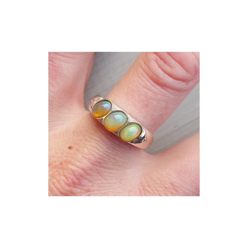 Silver ring set with three ethiopsiche opals 19.7 mm