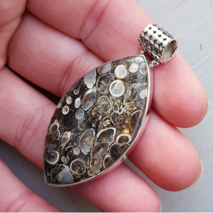 Silver pendant set with Marquise Turitella Agate