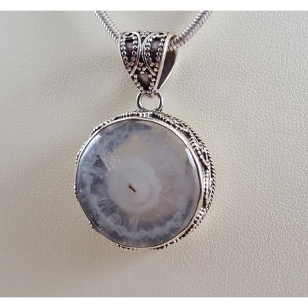 Silver pendant Round Solar Quartz put in edited setting