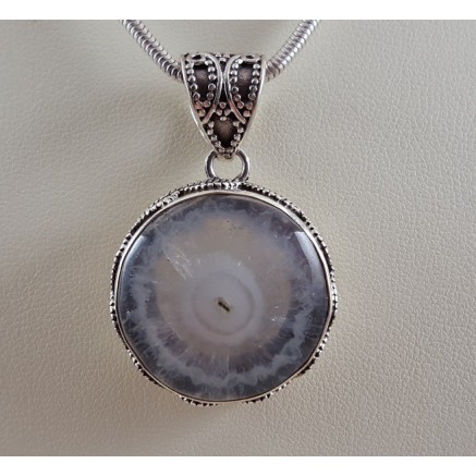 Silver pendant Round Solar Quartz put in edited setting