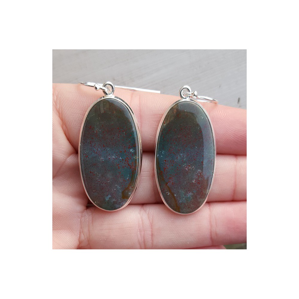 Silver earrings set with oval bloodstone