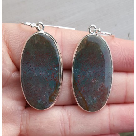 Silver earrings set with oval bloodstone