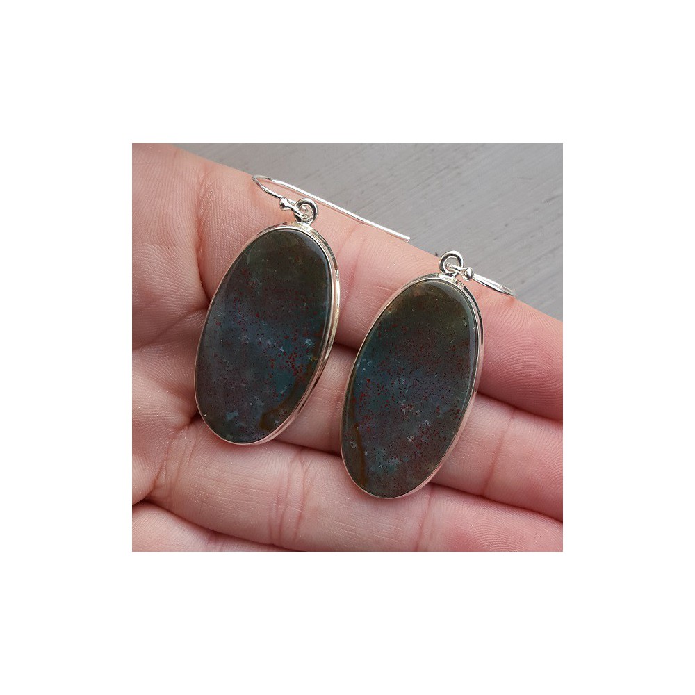 Silver earrings set with oval bloodstone