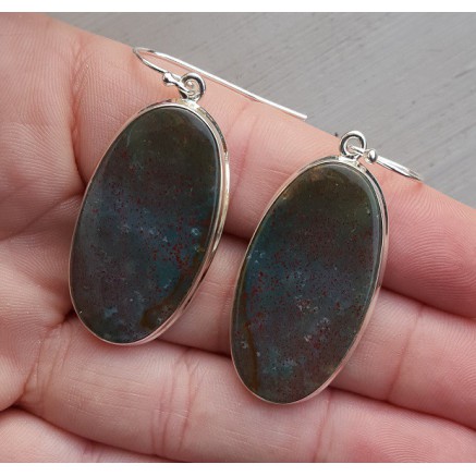 Silver earrings set with oval bloodstone