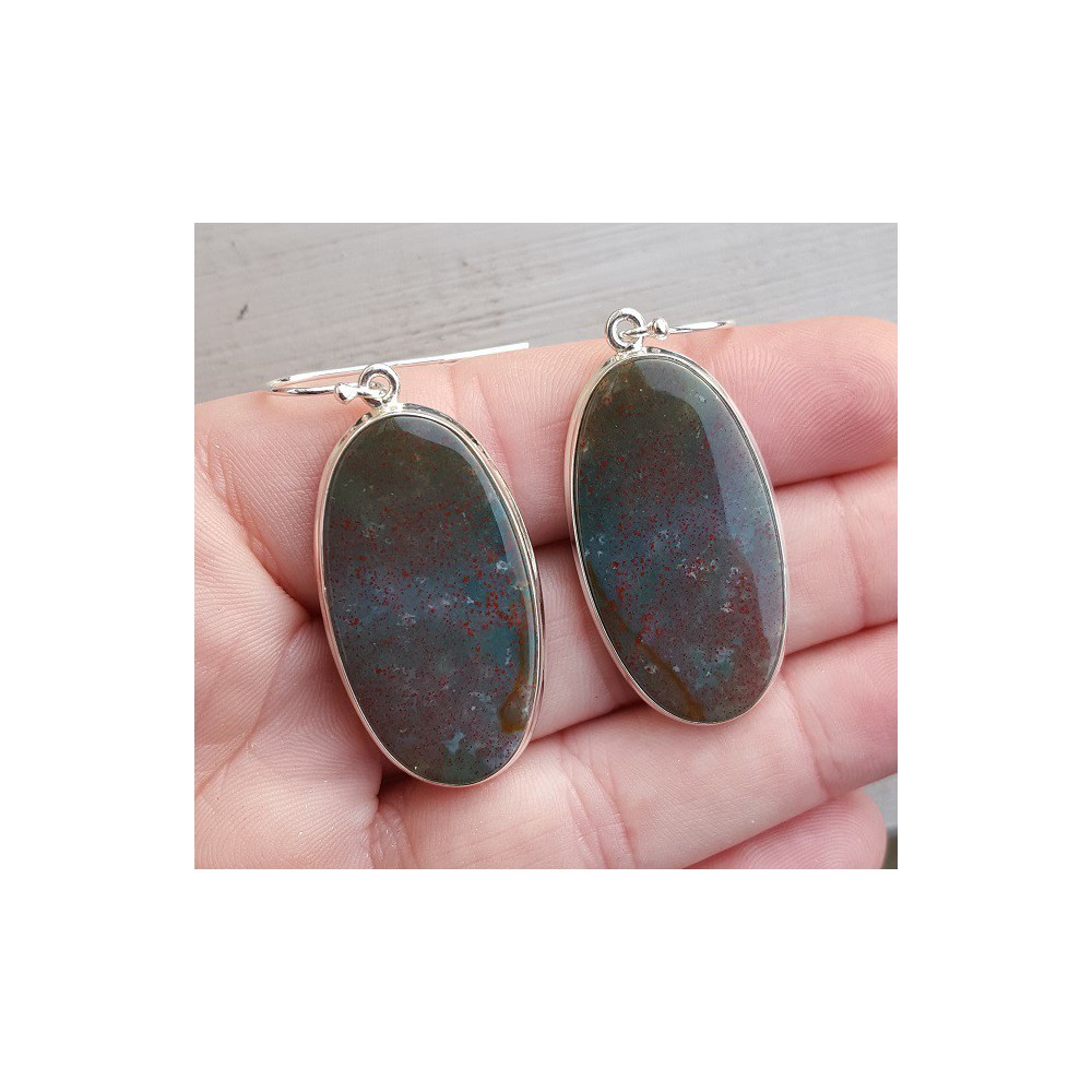 Silver earrings set with oval bloodstone