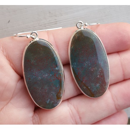 Silver earrings set with oval bloodstone