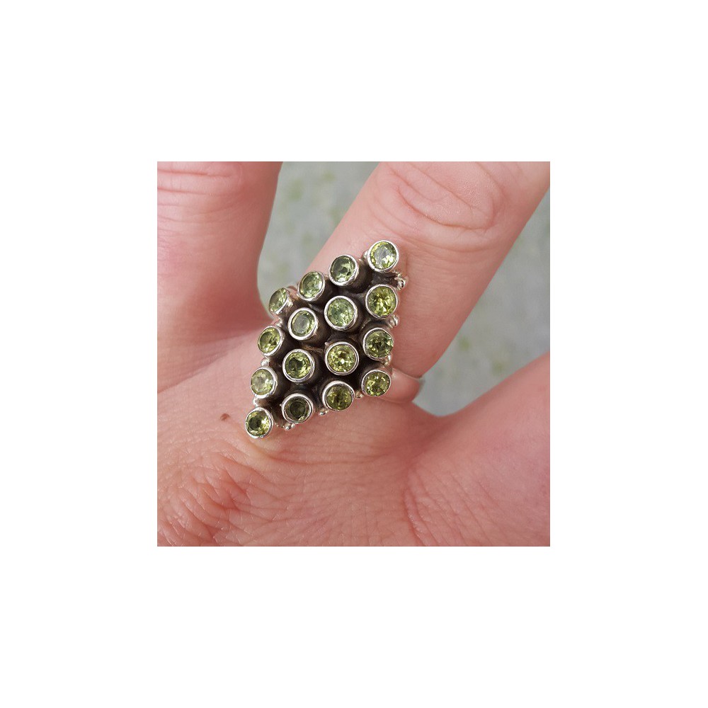 Silver ring set with peridot size 19 mm