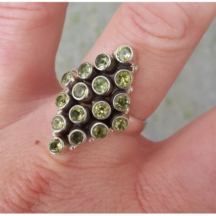 Silver ring set with peridot size 19 mm