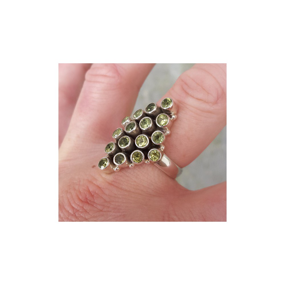 Silver ring set with peridot size 19 mm