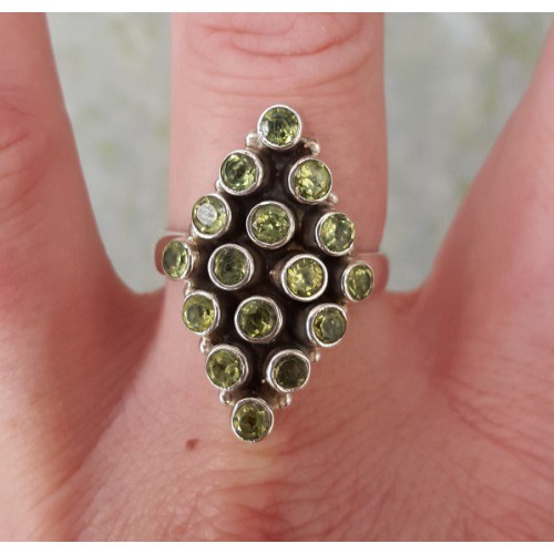 Silver ring set with peridot size 19 mm