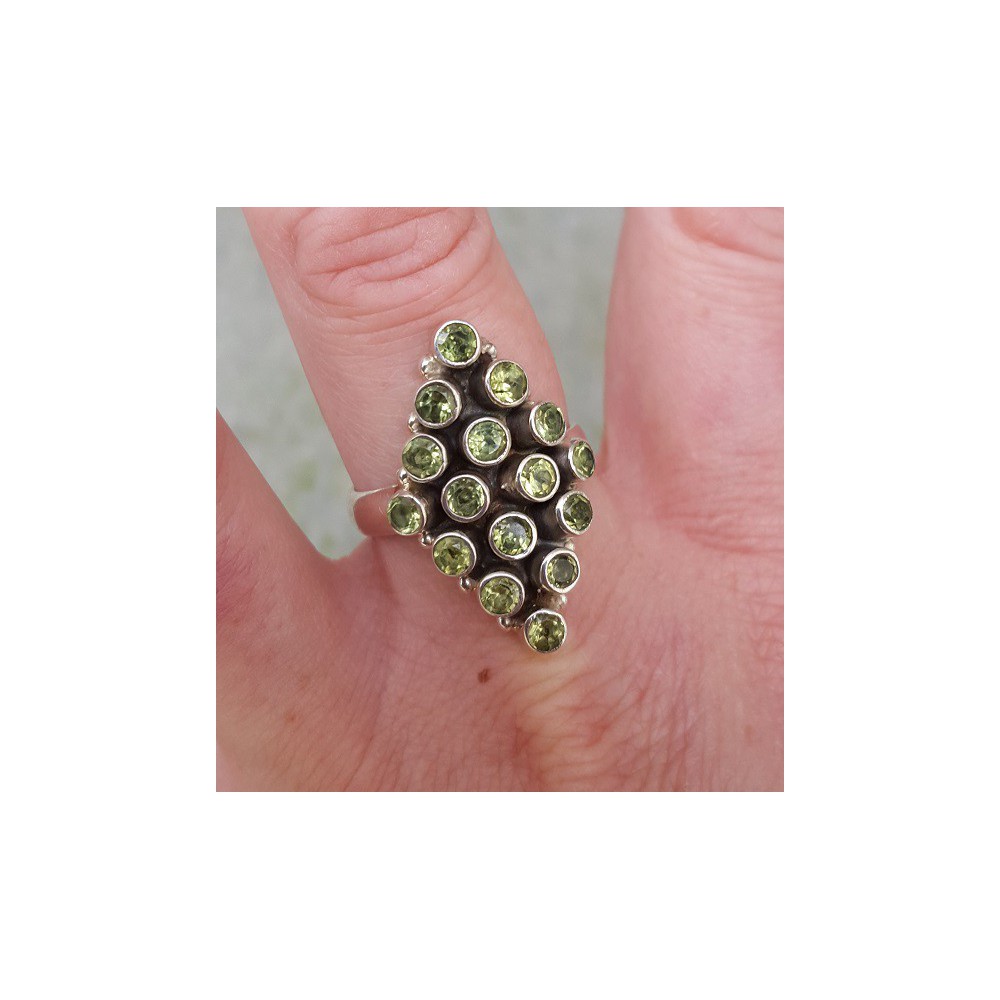 Silver ring set with peridot size 19 mm