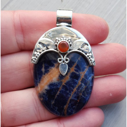 Silver pendant set with oval sodalite and carneool