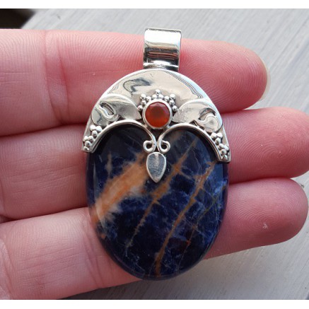 Silver pendant set with oval sodalite and carneool