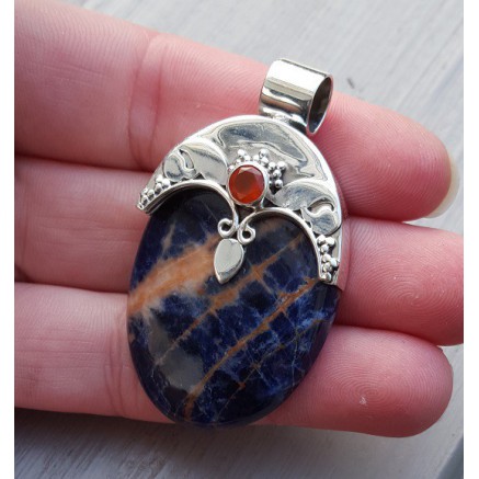 Silver pendant set with oval sodalite and carneool