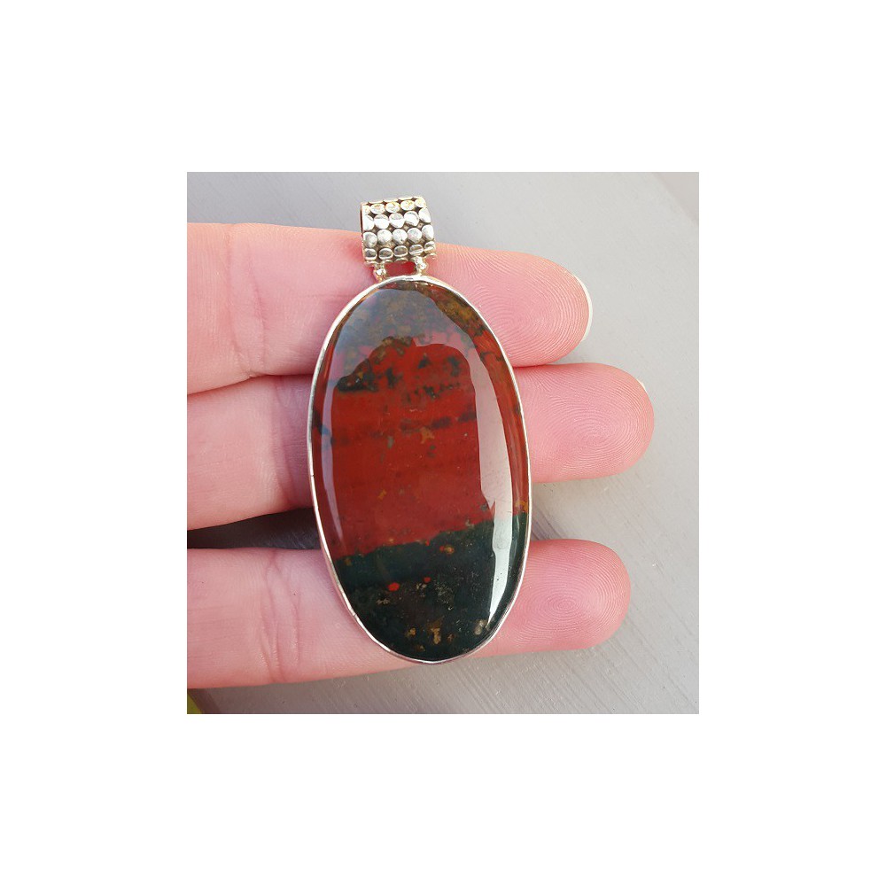 Silver pendant set with large oval cabochon bloodstone