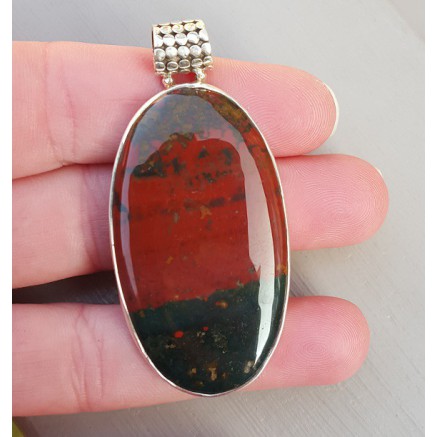 Silver pendant set with large oval cabochon bloodstone