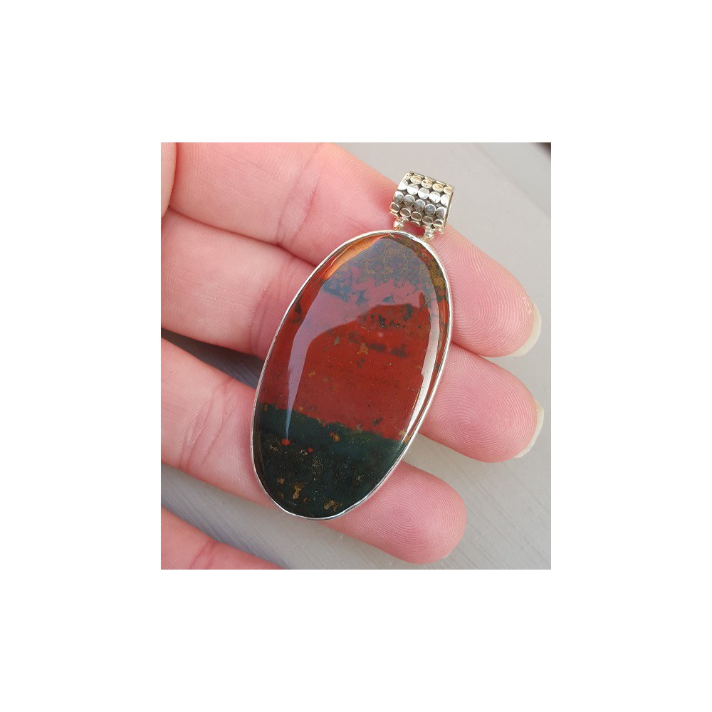 Silver pendant set with large oval cabochon bloodstone