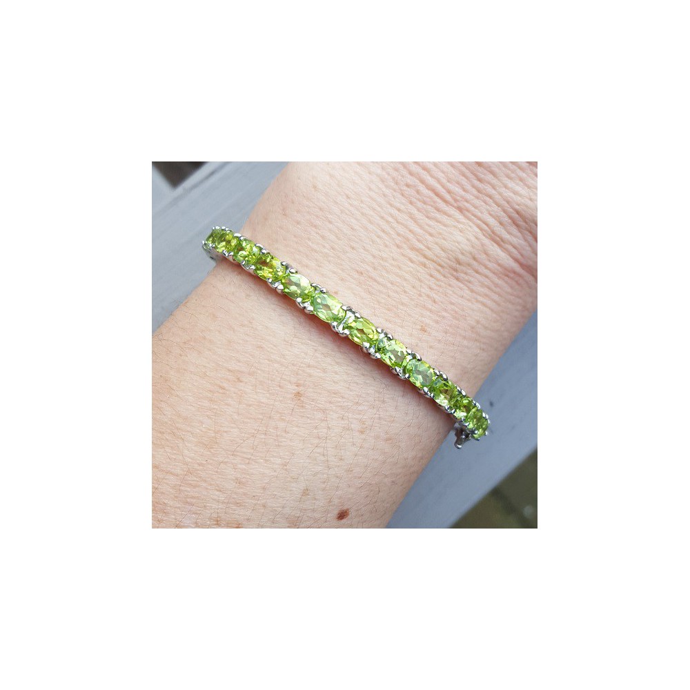 Silver bracelet / bangle with Peridot