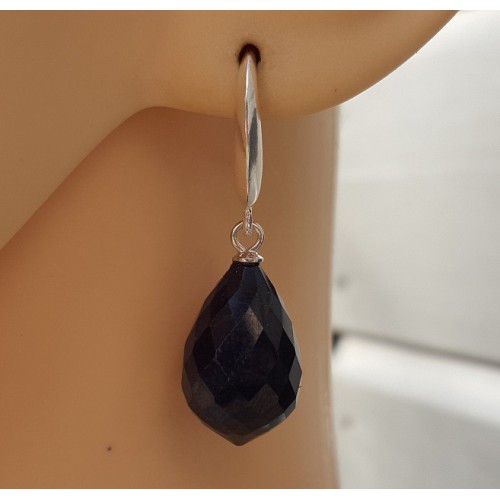 Silver earrings with large dark blue sapphire briolet