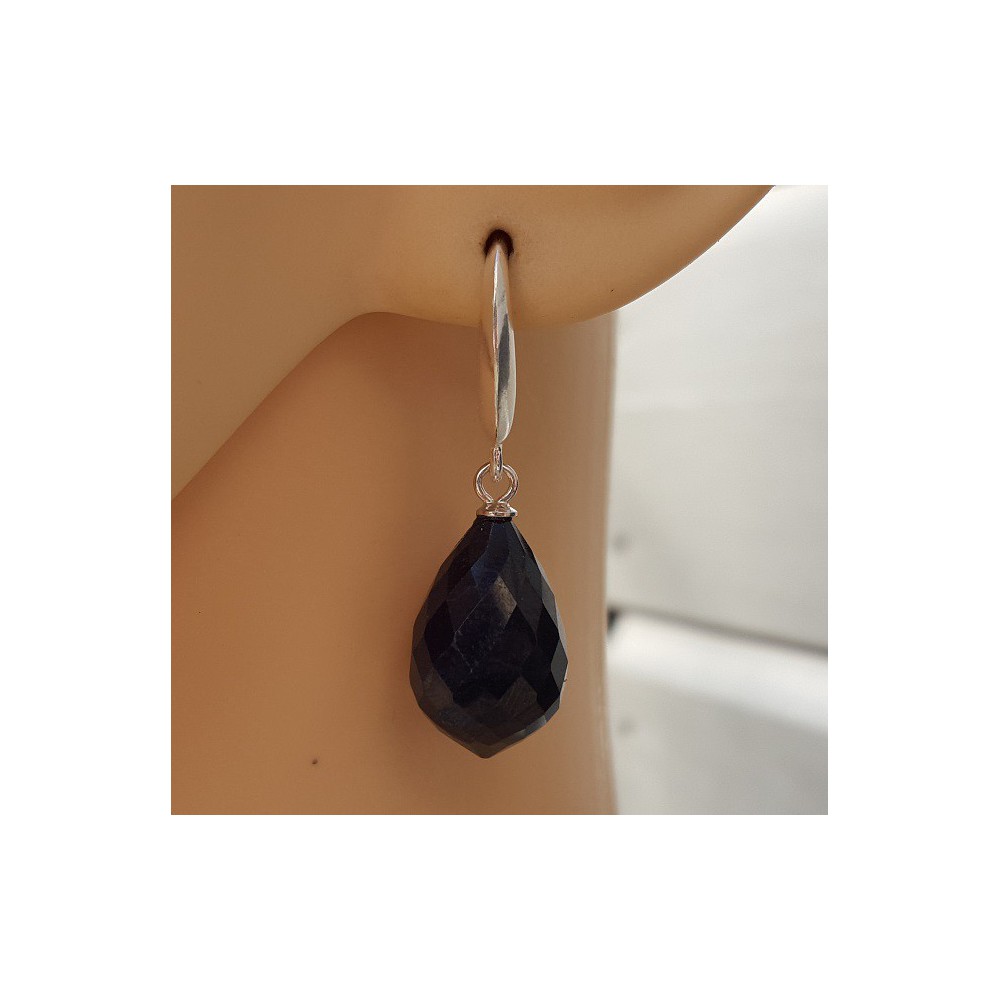 Silver earrings with large dark blue sapphire briolet