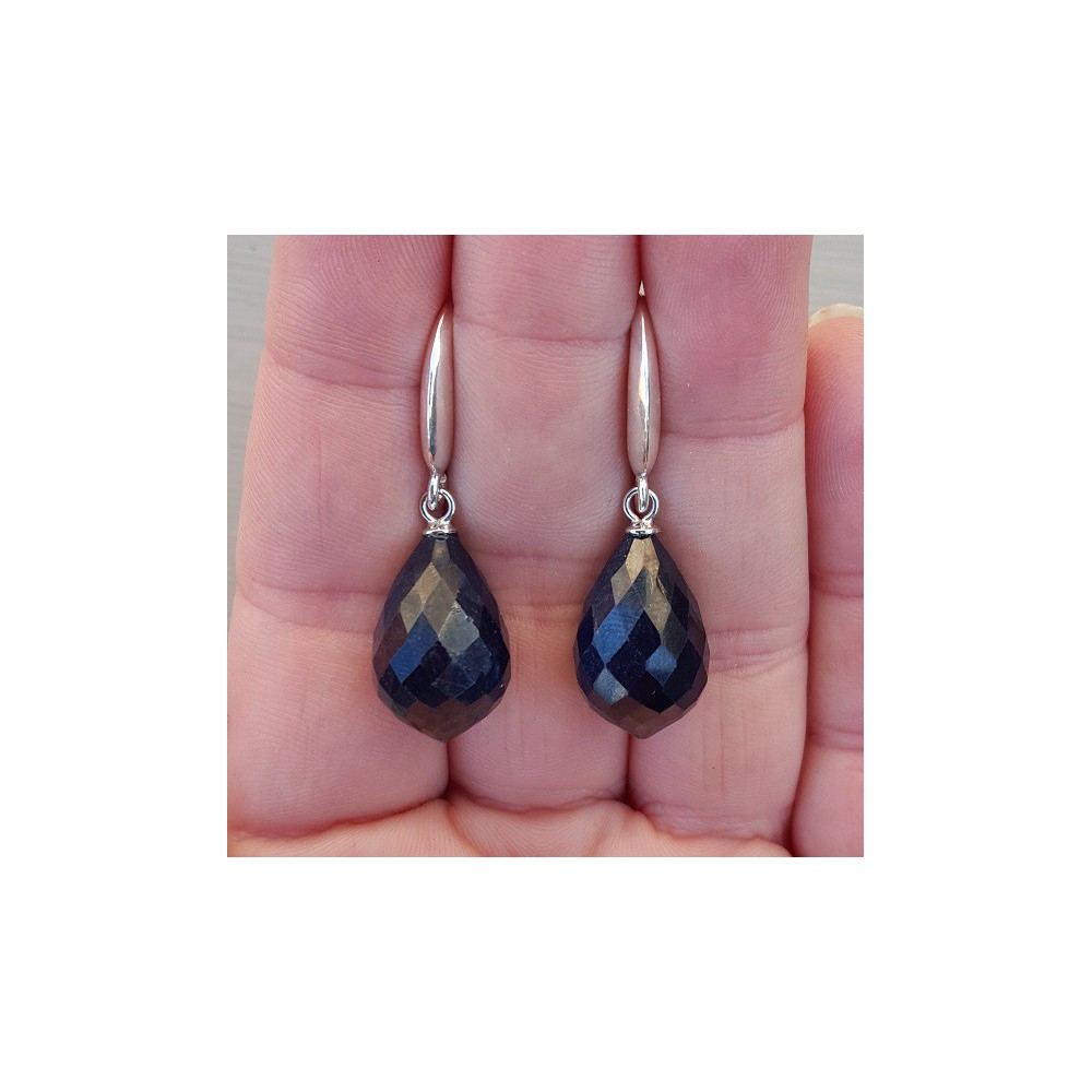 Silver earrings with large dark blue sapphire briolet