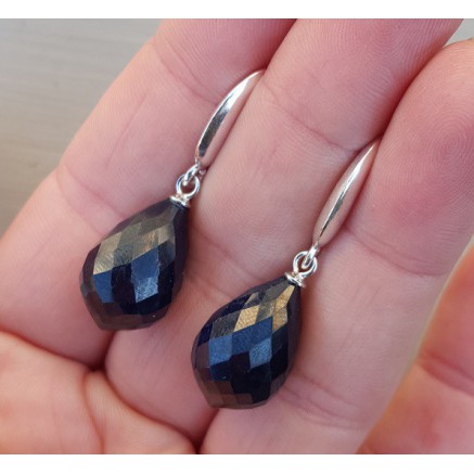 Silver earrings with large dark blue sapphire briolet