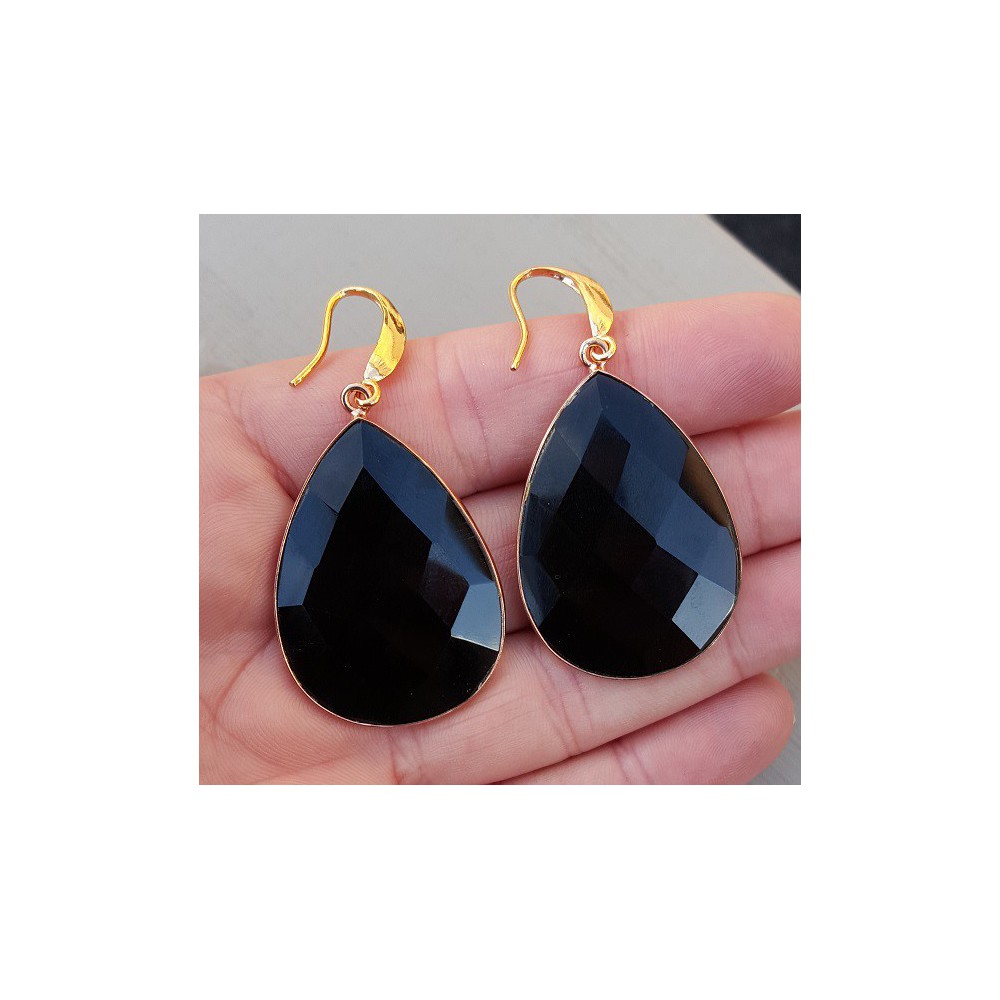 Rosé gilt earrings with large black onyx