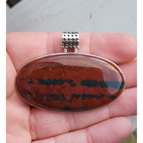 Silver pendant set with large oriental oval bloodstone