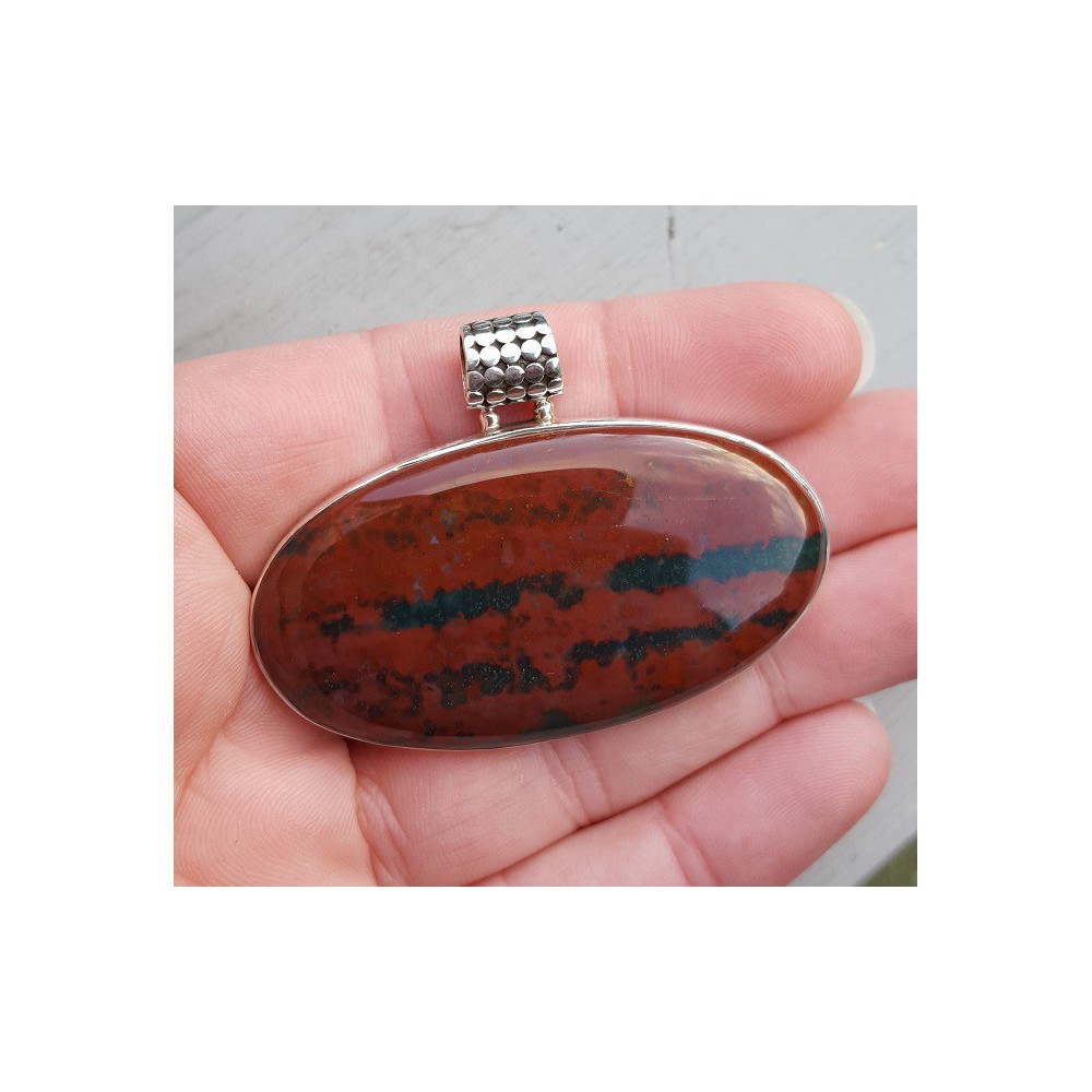 Silver pendant set with large oriental oval bloodstone