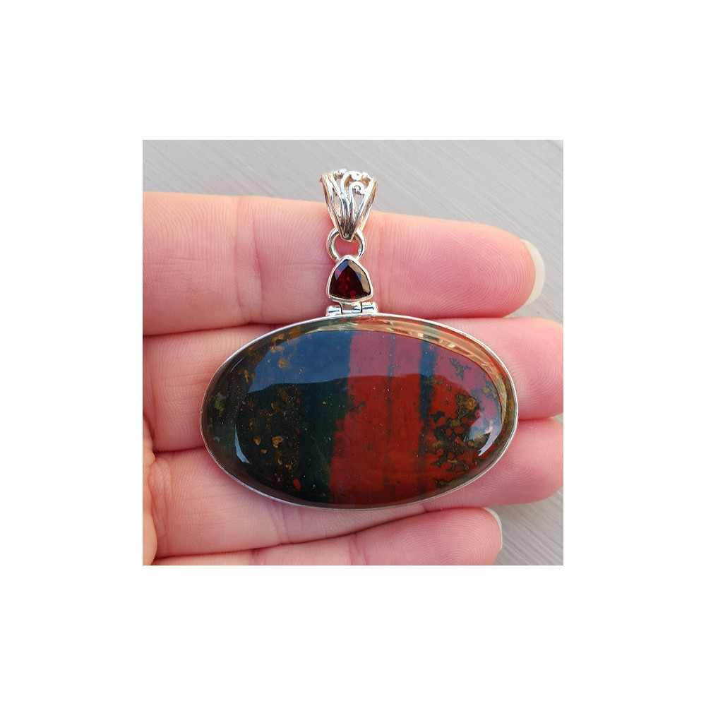 Silver pendant with triangular grenade and oval bloodstone