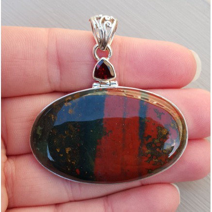 Silver pendant with triangular grenade and oval bloodstone