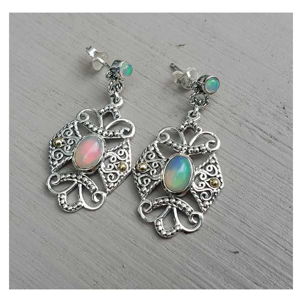 Silver earrings, Ethiopian Opals set in a carved setting