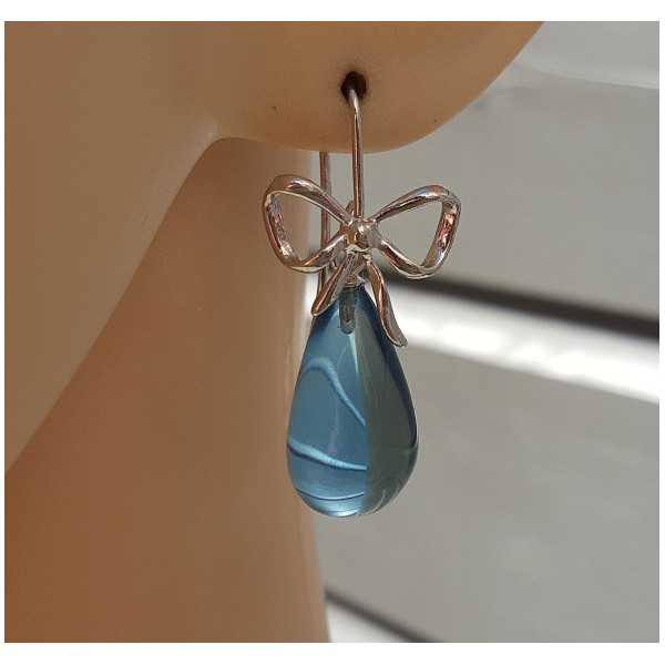 Silver earrings with blue Topaz quartz