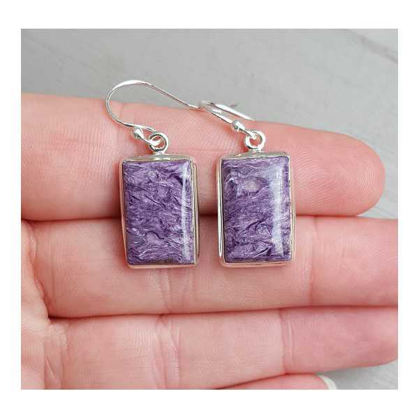 Silver earrings set with rectangular Charoiet