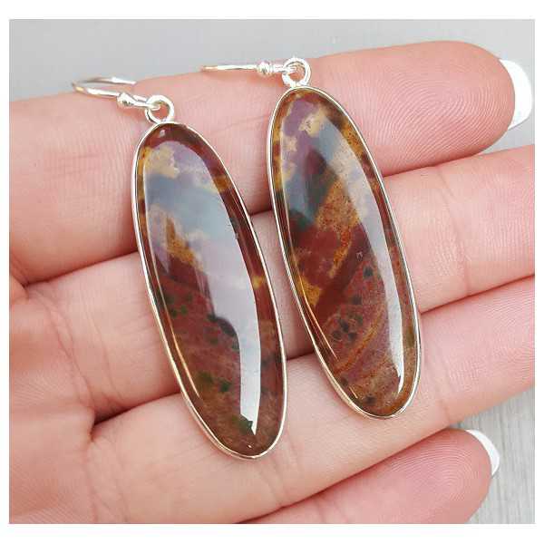 Silver earrings set with oval cabochon Bloodstone